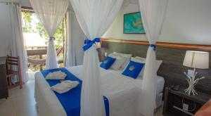 Cama ou camas em um quarto em Hotel Solar do Imperador