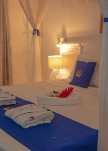 Cama ou camas em um quarto em Hotel Solar do Imperador