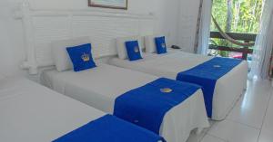 Cama ou camas em um quarto em Hotel Solar do Imperador