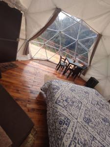 Postel nebo postele na pokoji v ubytování Chimborazo Basecamp