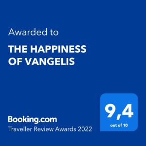 a blue sign with the words awarded to the happiness of variegated text at THE HAPPINESS OF VANGELIS in Paralia Vrachou