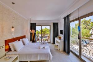 Postel nebo postele na pokoji v ubytování Arnna Hotel + 37 fotografií