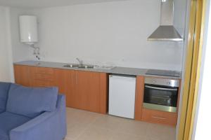 A cozinha ou kitchenette de Hotel Comércio