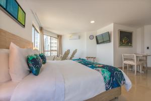 TV a/nebo společenská místnost v ubytování Hotel Regatta Cartagena