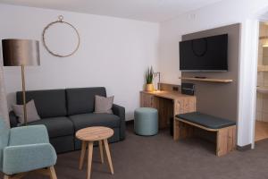 TV a/nebo společenská místnost v ubytování Gasthaus Hotel Kranz