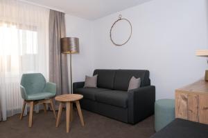 Posezení v ubytování Gasthaus Hotel Kranz