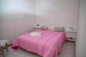 Posteľ alebo postele v izbe v ubytovaní B&B Nonna BI