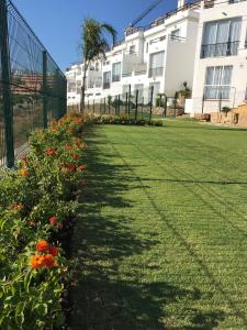A garden outside Manilva Townhouse with spectacular views of Gibraltar