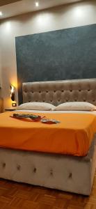 A bed or beds in a room at Appartamento ALECATIA 2