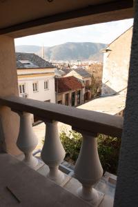 a view of a city from a balcony at Secret View Apartment in Mostar