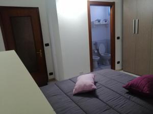 Posteľ alebo postele v izbe v ubytovaní B&B Nonna BI