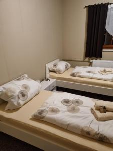 Postel nebo postele na pokoji v ubytování Pension Torgau