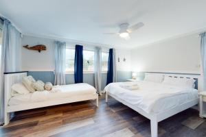 Postel nebo postele na pokoji v ubytování Cape Shell Oasis