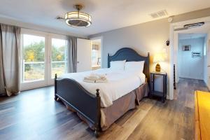 Postel nebo postele na pokoji v ubytování Cape Shell Oasis