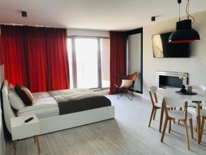 TV a/nebo společenská místnost v ubytování Apartament Przewidoki