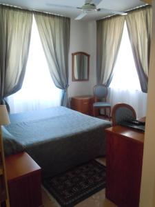 Кровать или кровати в номере Hotel Due Mari