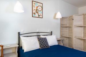 En eller flere senge i et værelse på Kampus living