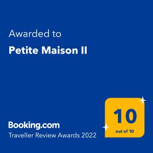 Сертификат, награда, вывеска или другой документ, выставленный в Petite Maison II