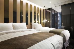 Jeongseon Intoraon Hotel客房内的一张或多张床位
