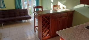 a kitchen with a counter and a counter top at Beach Studio 9 in Ocho Rios