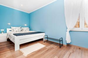 Posteľ alebo postele v izbe v ubytovaní OTTO apartment with sea view and parking