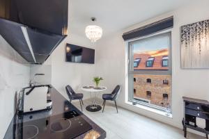 Telewizja i/lub zestaw kina domowego w obiekcie Granaria - Old Town