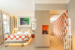 Ένα ή περισσότερα κρεβάτια σε δωμάτιο στο Boutiquehotel Das Tyrol