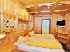 A television and/or entertainment centre at Chalet in Wald near Zillertal Ski Area