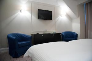 TV a/nebo společenská místnost v ubytování Hotel Focus