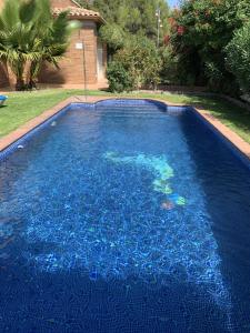 The swimming pool at or close to Villa Dacar