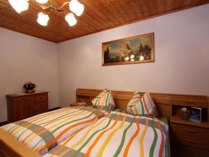 Posteľ alebo postele v izbe v ubytovaní Serene Cottage in Neukirchen am Großvenediger