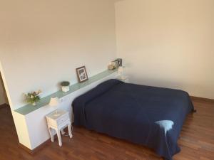 A bed or beds in a room at Villa Dacar