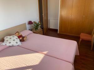 A bed or beds in a room at Villa Dacar