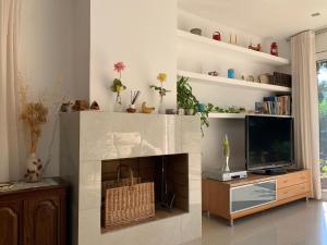A television and/or entertainment centre at Villa Dacar