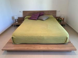 A bed or beds in a room at Villa Dacar
