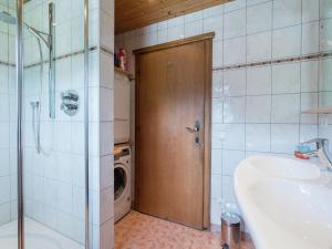 A bathroom at Apartment in Niedernsill near Zell am See Ski Lift