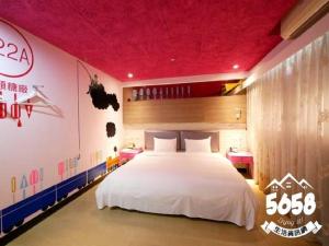 Postel nebo postele na pokoji v ubytování R8 Eco Hotel