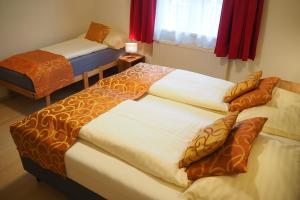 Voodi või voodid majutusasutuse Ferienwohnung Fürstenbrunn toas