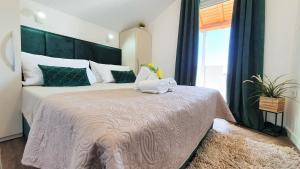 Posteľ alebo postele v izbe v ubytovaní Anas lagoon holiday house with pool at azure beach + 37 fotografií