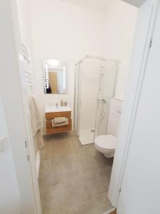 Koupelna v ubytování Gästezimmer Ödenburgerstraße