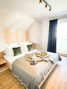 Postel nebo postele na pokoji v ubytování PAM Apartments