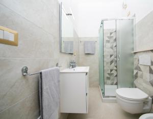A bathroom at Viale Italia Boutique Rooms