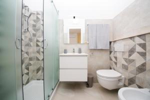 A bathroom at Viale Italia Boutique Rooms