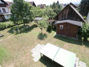 an aerial view of a yard with a shed at Holiday home in Carinthia near Lake Klopeiner in Eberndorf