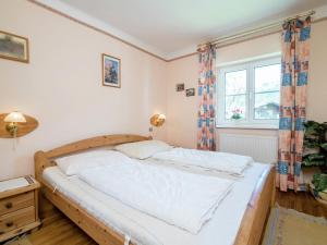 Łóżko lub łóżka w pokoju w obiekcie Apartment Kitzbuhel near Ski Slopes