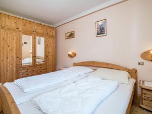 Łóżko lub łóżka w pokoju w obiekcie Apartment Kitzbuhel near Ski Slopes