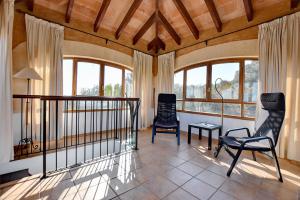 A balcony or terrace at Villa Can Pujadas by Slow Villas