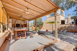 A balcony or terrace at Villa Can Pujadas by Slow Villas