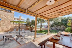 A garden outside Villa Can Pujadas by Slow Villas