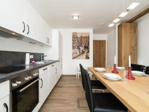 A kitchen or kitchenette at Apartment in Hollersbach near Ski Lift